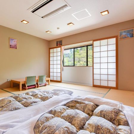 Отель Momijigawa Onsen Naka Экстерьер фото