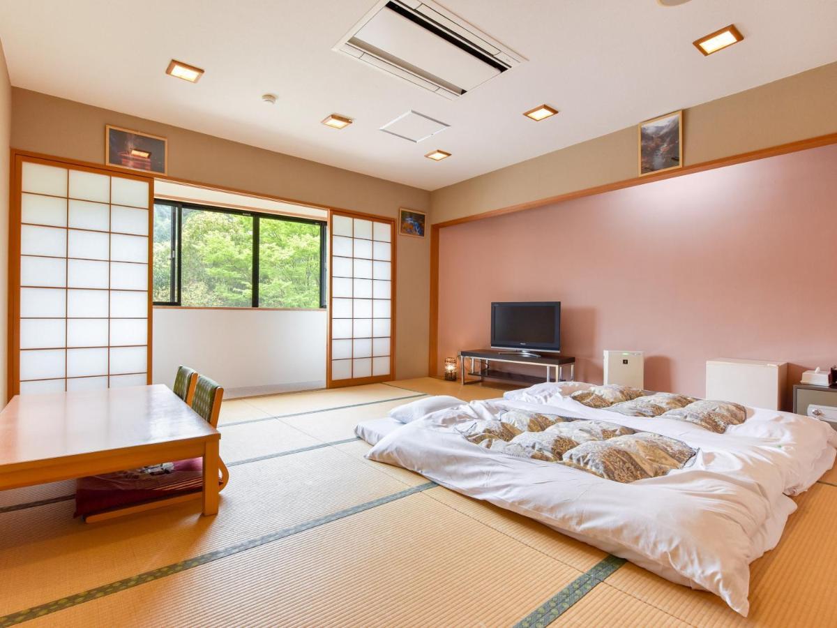 Отель Momijigawa Onsen Naka Экстерьер фото