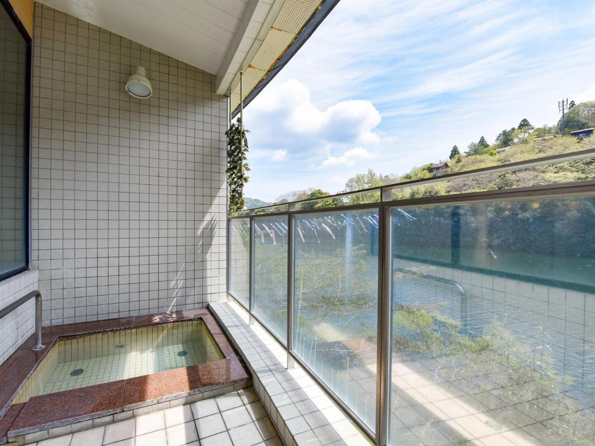 Отель Momijigawa Onsen Naka Экстерьер фото
