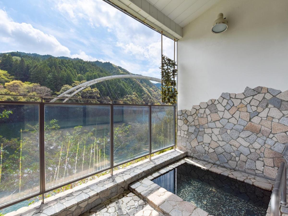 Отель Momijigawa Onsen Naka Экстерьер фото